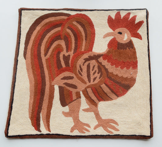 Pillow cover with a Rooster design. The Red, Brown and Orange colored Rooster is standing looking left